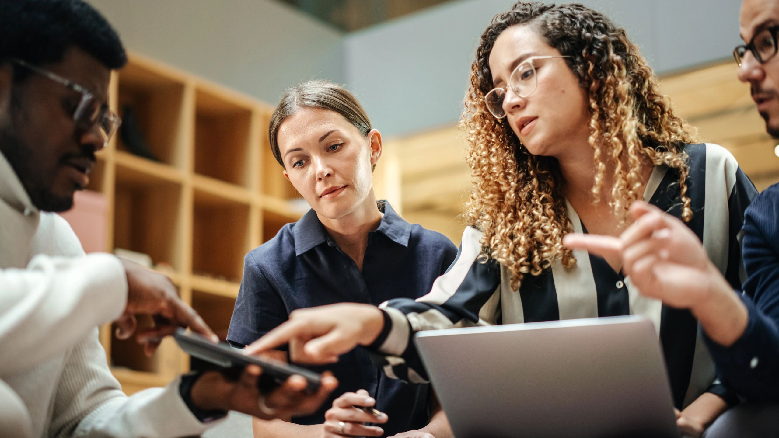 Technology team collaborating in a modern meeting room